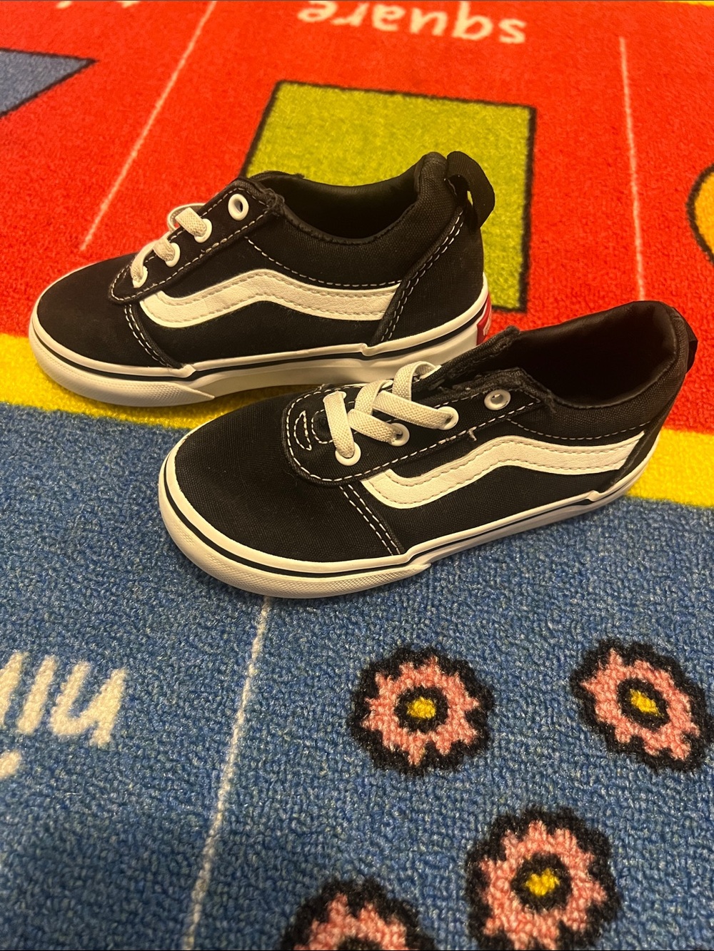 Black Vans Kids Canvas Skate Sneakers with White Stripe